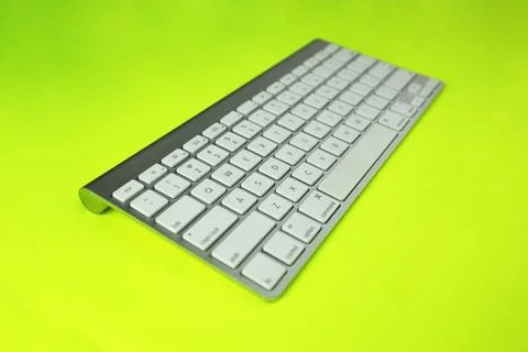 Gray keyboard with white buttons. Wireless keyboard. Computer components Stock Photos