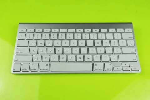 Gray keyboard with white buttons. Wireless keyboard. Computer components Foto stock