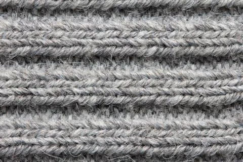 Gray knitted fabric background 库存照片