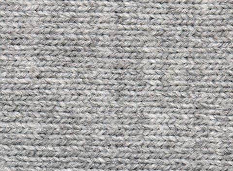 Gray knitted fabric background 库存照片