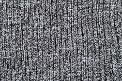 Gray knitted fabric texture background. Stock Photos