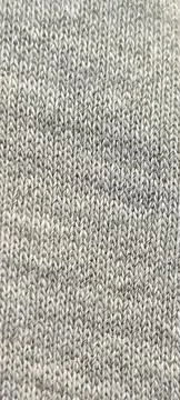 Gray knitted texture background clothes Stock Photos