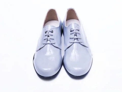 Gray lacquer shoes for a boy Stock Photos