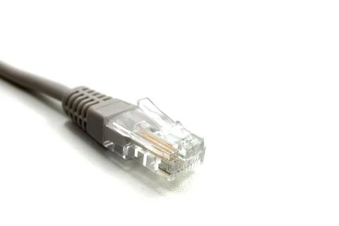 Gray LAN network connection ethernet cable. Internet cord RJ45 isolated on wh Stock Photos