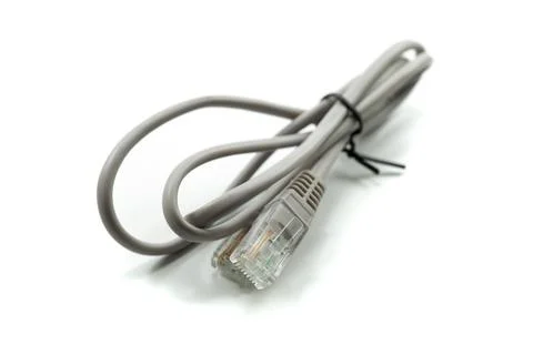 Gray LAN network connection ethernet cable. Internet cord RJ45 isolated on wh Stock Photos