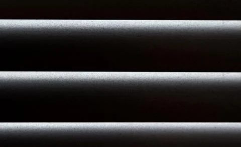 Gray lines on black background Stock Photos