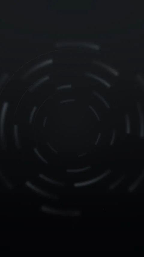 Gray lines swirl into concentric circles on a dark field Stock Footage 330560452