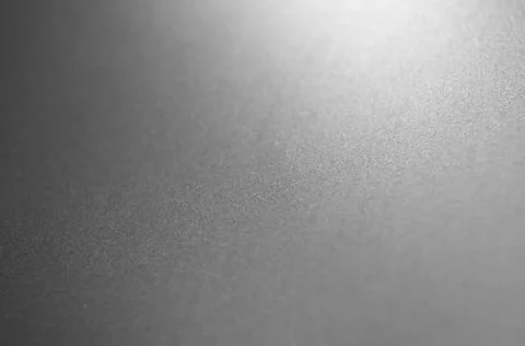 Gray metal background, gradient from white to black . Stock Photos