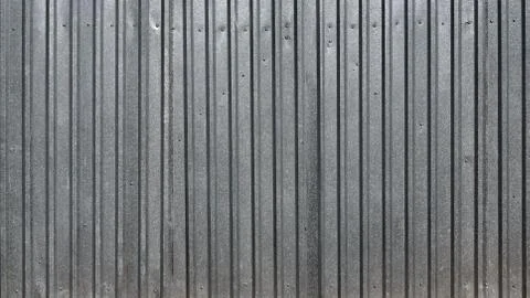 Gray metal decking. Sheets of gray corrugated iron Stock Photos