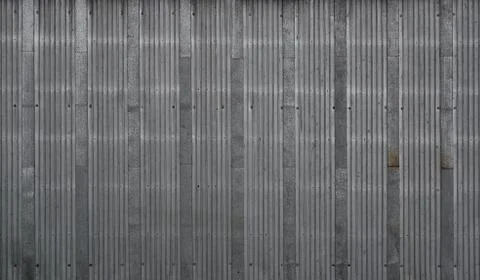 Gray metal decking. Sheets of gray corrugated iron Stock Photos