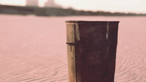 Gray metal garbage bin or trash can on the beach Stock Footage 237890535