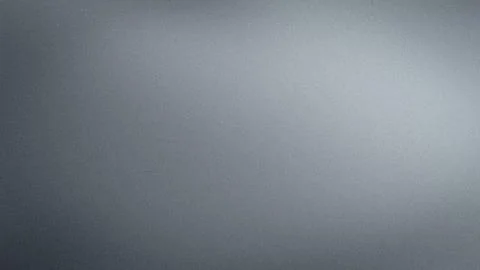 Gray metallic grainy texture background with subtle gradient for abstract t.. Stock Photos