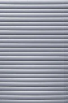 Gray metallic horizontal lines creating a modern background texture 写真素材