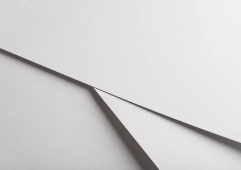 Gray minimal folded paper background abstract composition. Soft shadow surfac Stock Photos