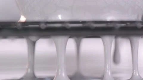 Gray mirror glaze dripping from the cake. Dessert preparation process. Stock Footage 157924506