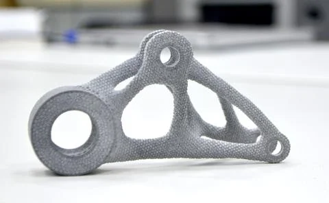 Gray models printed on 3D printer in laboratory office. Stock Photos