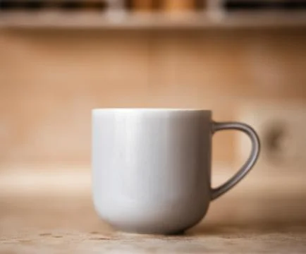 Gray mug on kitchen work surface Stock Photos