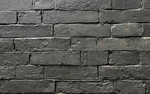 Gray old brick wall background Stock Photos