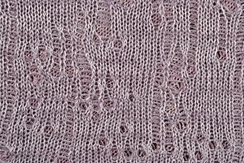 Gray openwork melange stockinet as background Stock Photos
