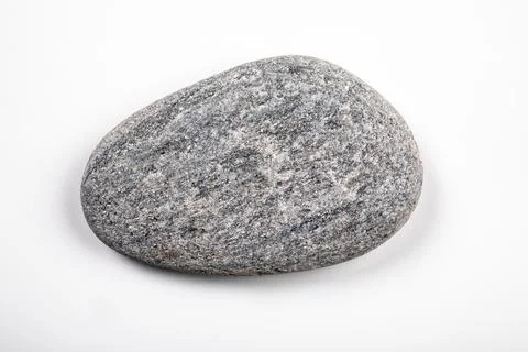 Gray, oval stone on a white background Stock Photos