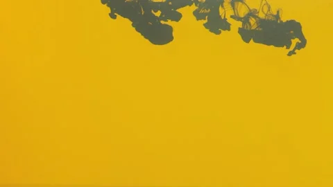 Gray paint in the orange water Stock Footage 148829654