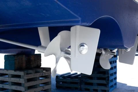 Gray painted propeller and steering with zinc anodes Stock Photos