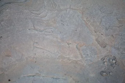 Gray pattern, rocky surface, stone background Stock Photos