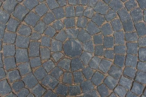 Gray paving stone paved with a pattern Stock Photos