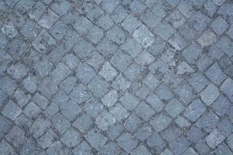 Gray paving stones as background Stock Photos