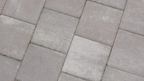 Gray paving stones top view for pavement background with concrete block pattern Stock Footage 338036564