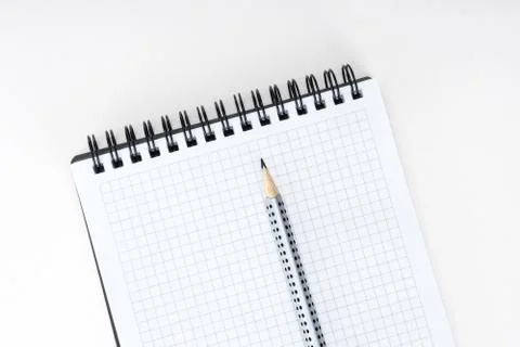Gray pencil on the notepad Stock Photos