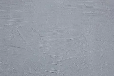 Gray plastered wall. Gray background. The texture of an old painted wall. Stock-Fotos