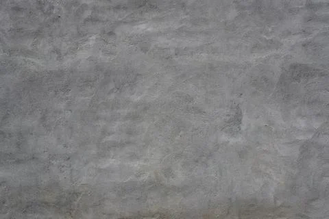 Gray plastered wall. Texture with plaster stains Stock Photos