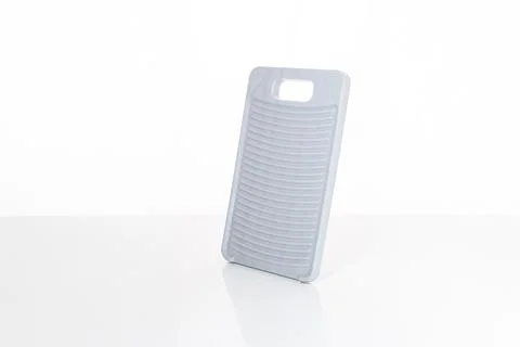 Gray plastic washboard, upright position, flat surface, white background, r.. Stock Photos