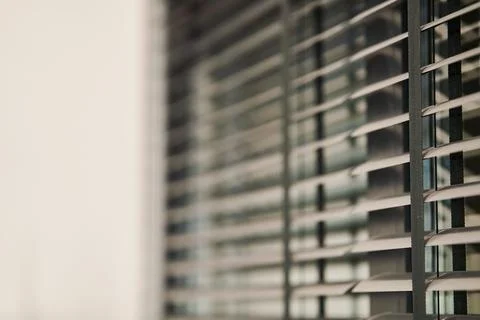 Gray plastic window blinds, close-up. Blinds Details Stock Photos