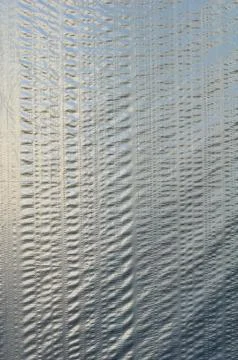 Gray polyethylene film's background Stock Photos