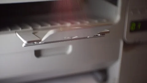 Gray printer during printing. video with glare Stock Footage 123743201