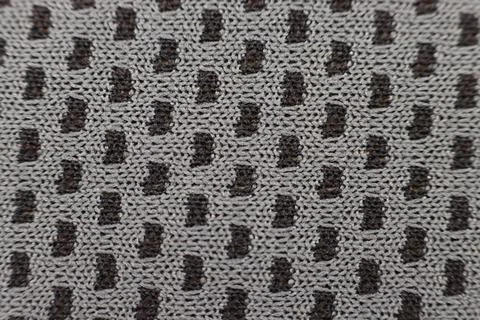Gray rag with black spots Stock Photos