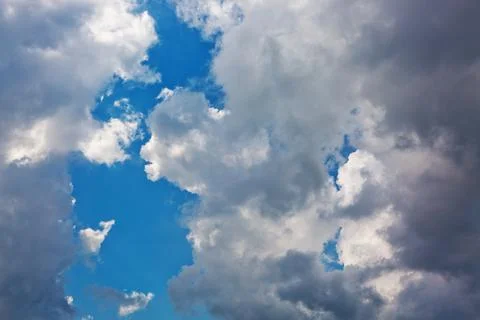 Gray rain clouds and blue sky in summer day. Foto stock