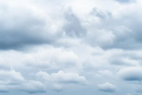 Gray rainy clouds in spring sky on overcast day Stock Photos