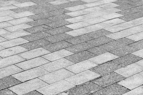 Gray rectangular paving stones, abstract background photo Stock Photos