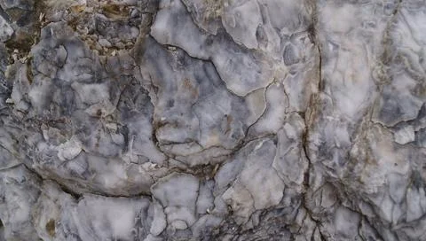 Gray Rock Texture with Circular Features Stock Photos