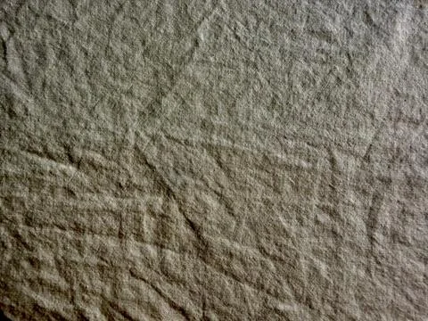 Gray rock texture macro closeup captures dramatic diagonal cracks and rugged  스톡 사진