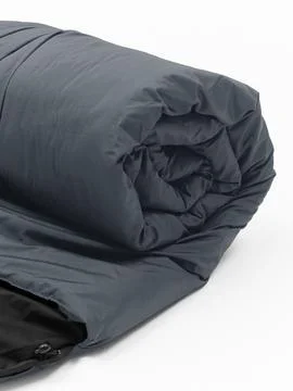Gray rolled sleeping bag variant Stock Photos