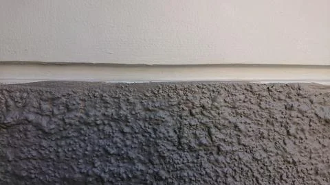 Gray Rough Cement wall and moss, soft shadow Stock Photos