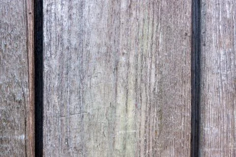 Gray rough old boards close-up. Background for design. Stock Photos