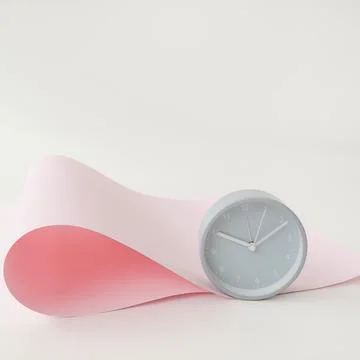 Gray round clock on a pink and white background. Mock-up Stock Photos