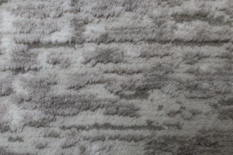 Gray rug fluffy texture, flat lay close up, abstract patterned backdrop Foto stock