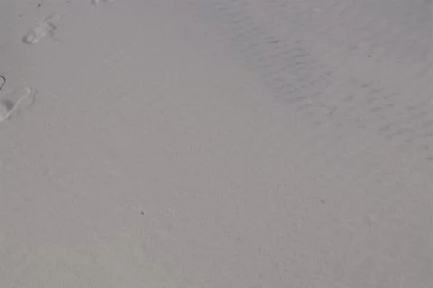 Gray sand on the beach Stock Photos