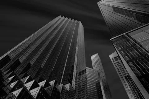 Gray scale low angle shot of magnificent skyscrapers Stock Photos